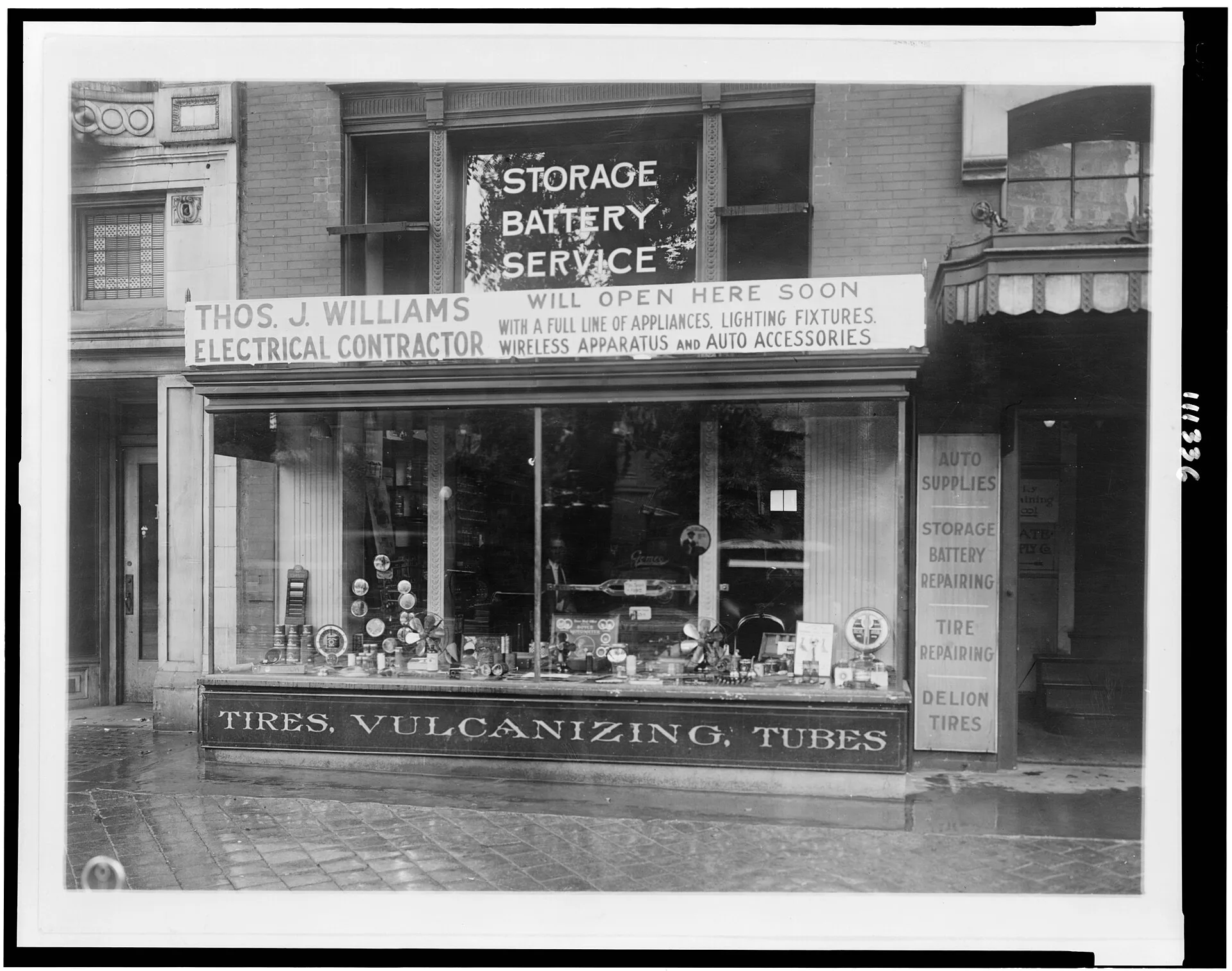 Title: Show window of Thomas J. Williams, electrical contractor, Washington, D.C.(?) Abstract/medium: 1 photographic print. Electrical contractor legal and insurance guide for the US and Canada: what to line up first