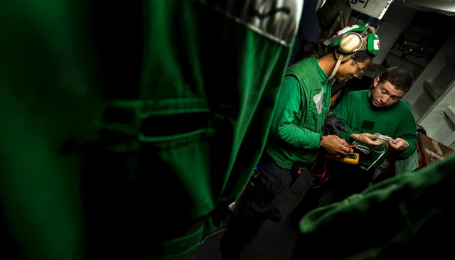 ARABIAN SEA (Feb. 3, 2011) Aviation Electrician's Mate 1st Class Gregory Gates and Aviation Electrician's Mate 2nd Class Brian Smith, both assigned to Strike Fighter Squadron (VFA) 25, run electrical tests on aircraft equipment inside the squadron electrical shop aboard the Nimitz-class aircraft car. Second-hand or new electrical contractor business equipment: a cost decision
